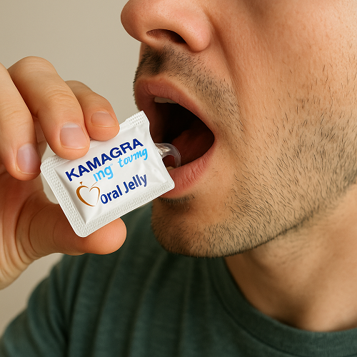 A person squeezing and directly consuming Kamagra Oral Jelly 100mg