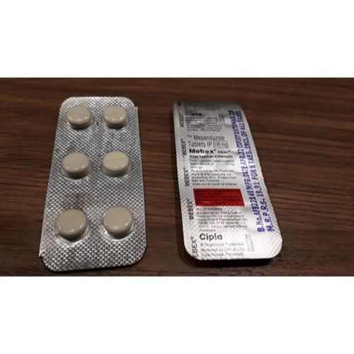 Mebex 100mg silver blister strip with dosage label and brown tablets