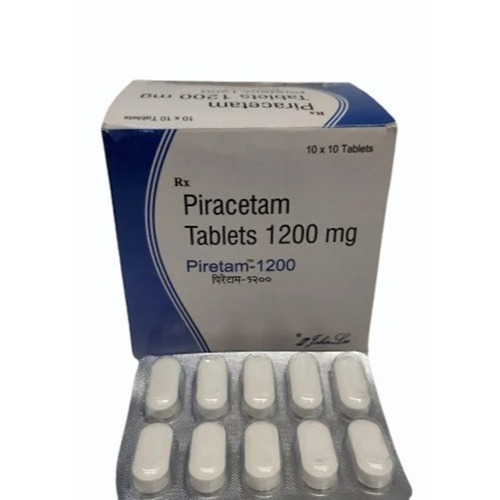 Open blister strip of Piretam 1200mg tablets with outer carton visible