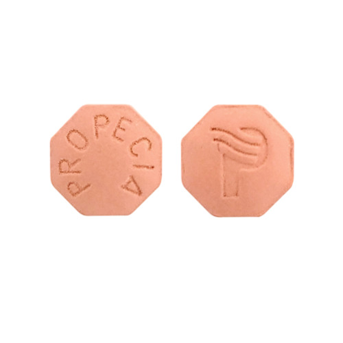 Propecia 1mg finasteride tablets close-up – octagonal pills with imprint