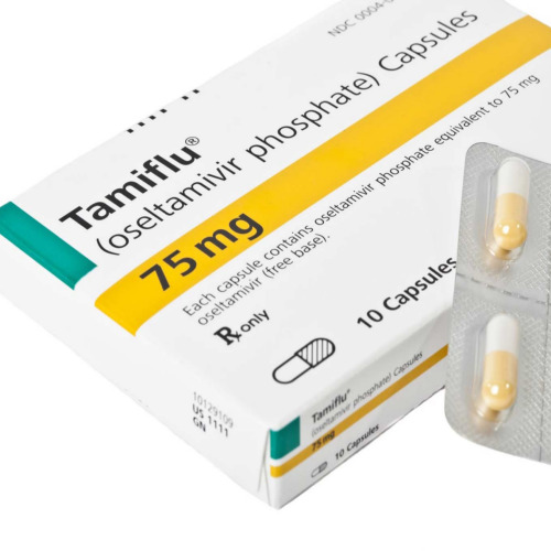 Tamiflu 75mg capsules blister strip with printed text and Roche branded carton