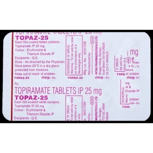 Close-up of Topaz 25 blister strip and leaflet, tablet imprints and printed info readable