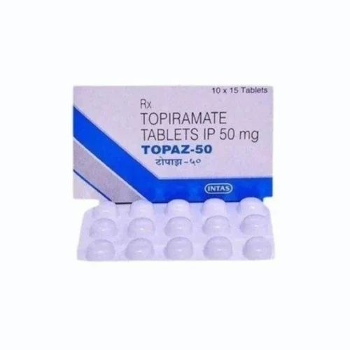 Topaz 50 blister pack laid flat with box, top-down/angled shot with tablet imprints and packaging legible
